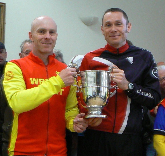 Andy Bason receives the Donovan Trophy from Nik Gardiner
